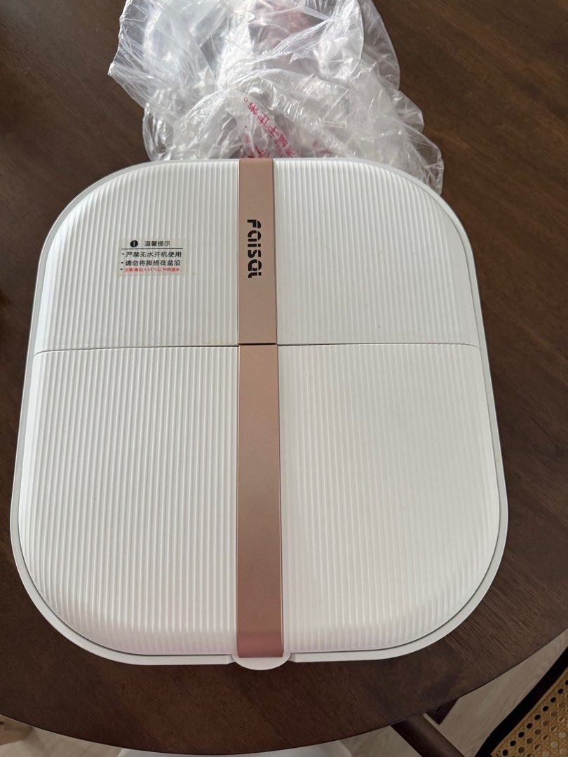 Foisit Foot Massager - Brand New (Category: Massage Devices) located in Singapore. Submitted by perfect_gud (Listing ID 1378572093, Image 1). Description: Brand new Foisit foot massager. Features a foldable design for easy storage. Includes rollers and massage nodes for a relaxing foot massage. .