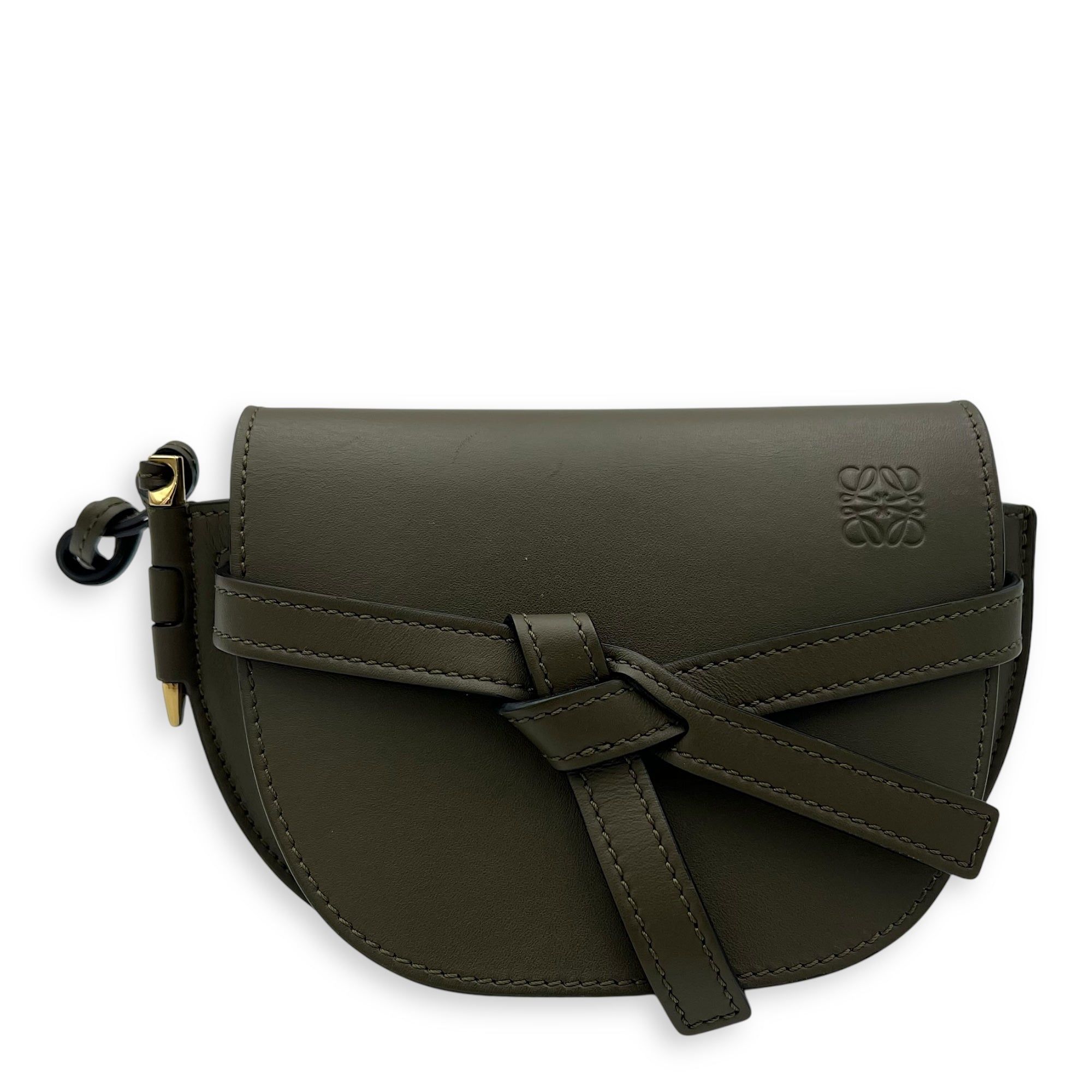 Loewe Gate Shoulder Bag Dual Green in Calfskin, Gold hardware (Category: Bags & Wallets) located in Singapore. Submitted by carousellluxury (Listing ID 1378560578, Image 1). Description: SKU S2507-006984AN Material Calfskin Size Dual Color Green Hardware Gold Strap Not IncludedDimension (L)23cm x (H)17cm x (W)9cm Accessories Dust Bag, Series 522136 Circa Est 2021 Microchipped FALSE PS: Available for Private-Viewing, Standard and Express delivery 