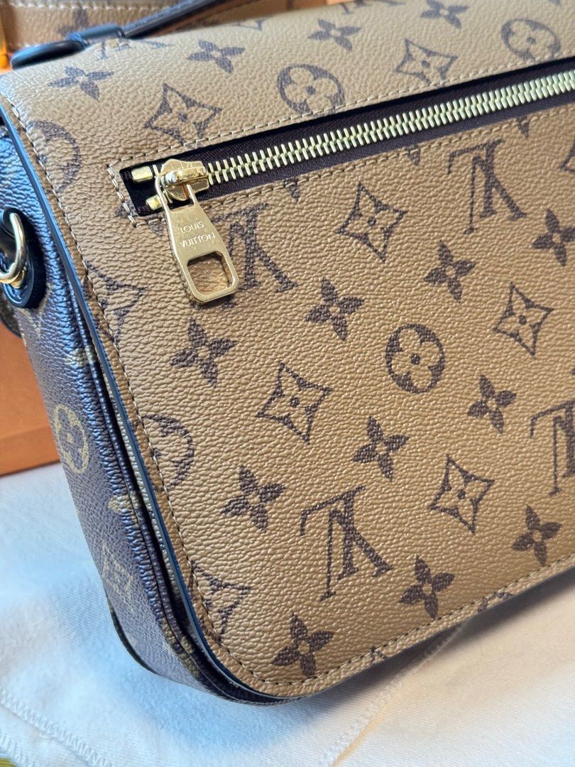 Louis Vuitton Monogram Shoulder Bag (Category: Bags & Wallets) located in Singapore. Submitted by daisydayg (Listing ID 1378637190, Image 3). Description: Authentic Louis Vuitton shoulder bag in excellent condition. Features the iconic monogram pattern and a stylish design. Includes a detachable strap for versatile carrying options. Perfect for everyday use or special occasions. Comes with original box. .
