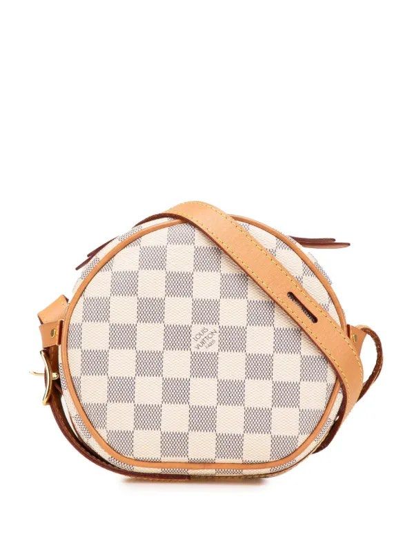 Louis Vuitton Round Bag (Category: Bags & Wallets) located in Singapore. Submitted by kokoolee (Listing ID 1378686718, Image 1). Description: Damier Azur Boite Chapeaux Souple PM crossbody bag. Comes with certificate, receipt from Ion Orchard, dust bag, LV box, and LV shopping bag. Round, mini white bag for everyday use. Fits card holder and phone. Shoulder strap is adjustable. The bag’s color suits any style of dressing. I prefer to meet up only