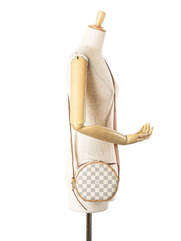 Louis Vuitton Round Bag (Category: Bags & Wallets) located in Singapore. Submitted by kokoolee (Listing ID 1378686718, Image 2). Description: Damier Azur Boite Chapeaux Souple PM crossbody bag. Comes with certificate, receipt from Ion Orchard, dust bag, LV box, and LV shopping bag. Round, mini white bag for everyday use. Fits card holder and phone. Shoulder strap is adjustable. The bag’s color suits any style of dressing. I prefer to meet up only