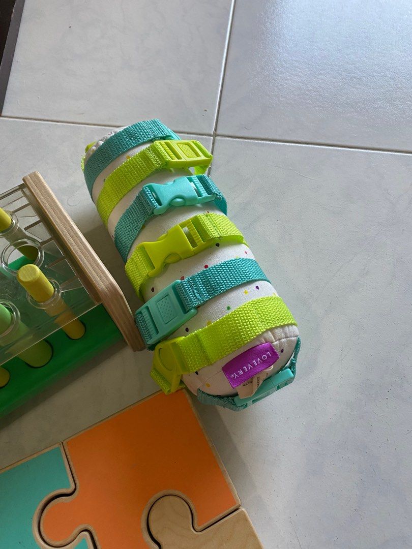 Lovevery The Inspector Play Kit (some toys from the kit) (Category: Infant Playtime) located in Singapore. Submitted by meowlene (Listing ID 1378539726, Image 2). Description: Some toys from the Lovevery Inspector play kit includes a chunky wooden jigsaw puzzle, buckle barrel, mosaic button board, wooden posting stand. All items are in great condition but the wooden posting stand is missing 2 rods. Perfect for toddlers to develop fine motor skill