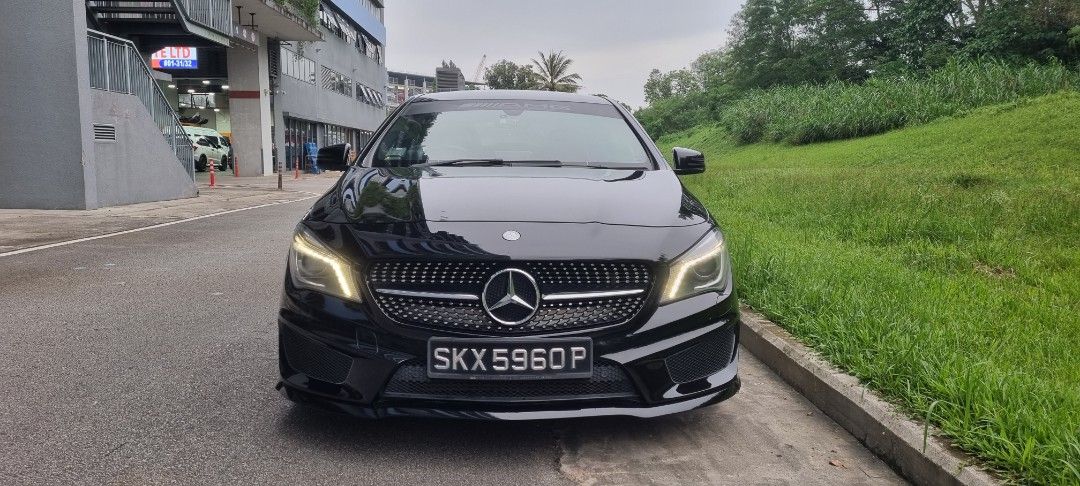 Mercedes-Benz CLA180 AMG-line rental (Category: Car Rental) located in Singapore. Submitted by MajesticAutosg (Listing ID 1366107346, Image 2). Description: The Mercedes Benz CLA180 AMG-LINE is a sleek sedan offering a sporty and stylish experience. Featuring a fuel-efficient and responsive powertrain, the CLA stands out with detailed styling & comfort. This beautiful CLA180 AMG-line is now available in Comes with: - AMG Bodykit - AMG Steering wh