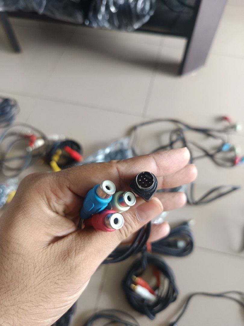 Multiple RCA AUDIO video cables and other audio cables with 3.5 mm jack also.63208338544257113