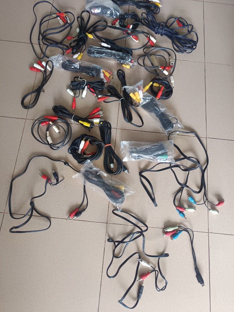 Multiple RCA AUDIO video cables and other audio cables with 3.5 mm jack also.63208338544257111