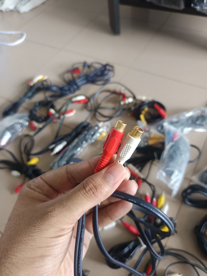 Multiple RCA AUDIO video cables and other audio cables with 3.5 mm jack also.63208338544257114