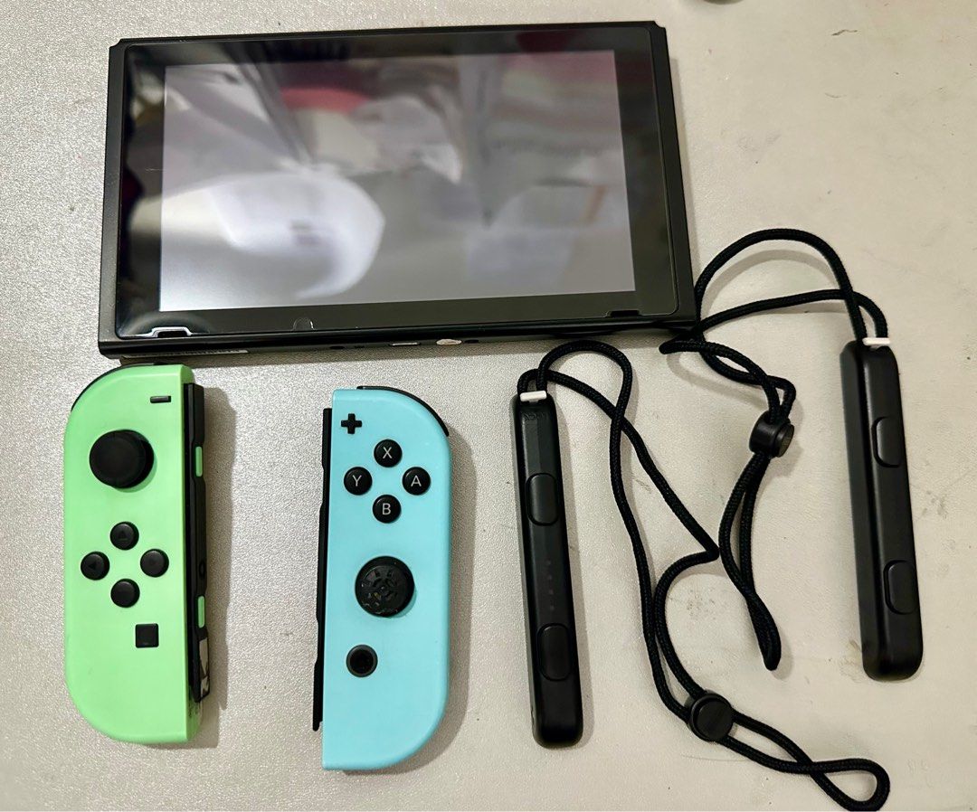 MAKE OFFER Nintendo Switch v2 Animal Crossing Edition Jailbroken with games (Category: Nintendo) located in San Juan City. Submitted by angieanghelita (Listing ID 1378711371, Image 3). Description: 🚨 Slightly Used & In Excellent Condition! ✅ V2 Animal Crossing Limited Edition Console ✅ Jailbroken – Ready for custom firmware ✅ 256GB microSD card included ✅ Pre-installed with games ✅ Complete with Original Box & Joy-Cons ✅ Charger included (not sh