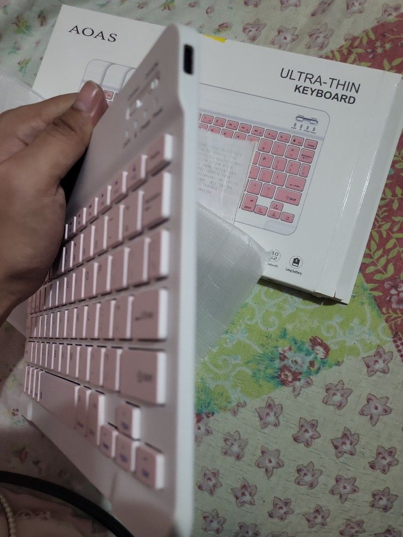 Pink Ultra-thin Bluetooth Keyboard (Category: Computer Keyboard) located in Digos. Submitted by itseller03 (Listing ID 1378691213, Image 3). Description: - Brand new - USB Type C charging - Bluetooth keyboard - Light and portable - Ultra-thin design - Color pink - Complete with box, manual, and receipt. - Original price is 550 pesos. RFS: not been used.