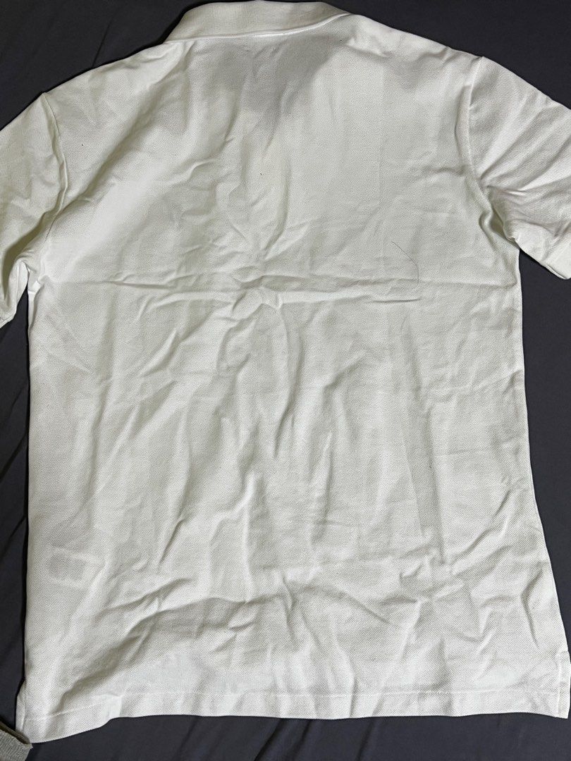 Polo Ralph Lauren Custom Fit Polo Shirt - White - Medium (Category: Tshirts & Polo Shirts) located in Singapore. Submitted by nclvn (Listing ID 1378562208, Image 3). Description: Negotiable Authentic Polo Ralph Lauren polo shirt in size Medium. Features the iconic polo player logo. The shirt is in good condition, with minimal signs of wear. Perfect for a casual yet stylish look. A versatile piece for any wardrobe. Selling because I bought a small
