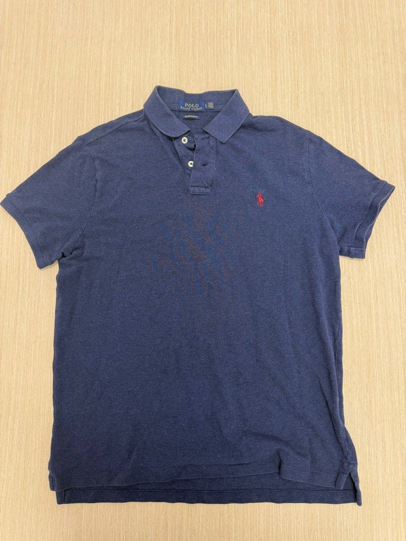 Polo Ralph Lauren Custom Slim Fit Navy Blue Polo Shirt (Category: Tshirts & Polo Shirts) located in Singapore. Submitted by gnesoyam (Listing ID 1378704641, Image 1). Description: Custom slim fit - L PTP 53cm Length 60cm Shoulder to shoulder 45cm Sleeve Length 19cm.