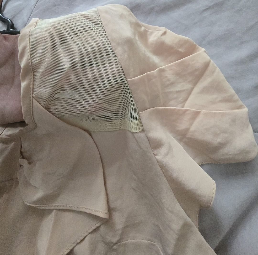 RIVER ISLAND Nude-colour Vintage Blouse with Bow Detail + Translucent Mesh Panel (Category: Blouses) located in Singapore. Submitted by lttow (Listing ID 1378717718, Image 2). Description: This was bought from River Island UK some years ago. It's an elegant office wear that's got a soft pink-nude hue. Features a unique frontal bow/ruffles detail and sheer mesh paneling at the neckline/collarbone. Perfect for adding a touch of sophistication to an