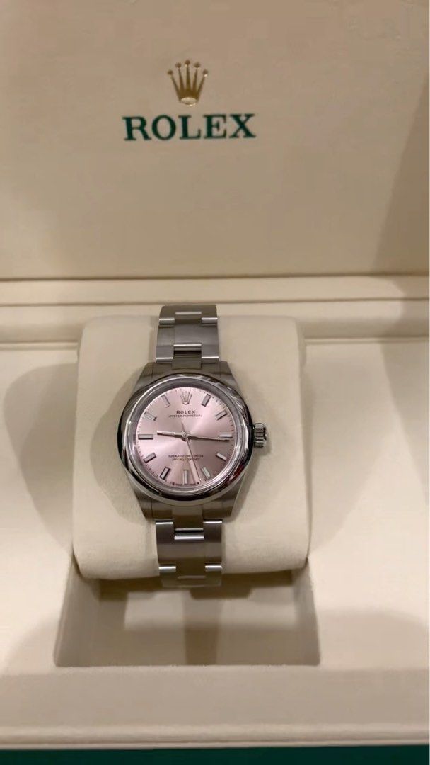 Rolex Oyster Perpetual 28 Stainless Steel Watch 276200 pink (Category: Watches) located in Singapore. Submitted by cavanong (Listing ID 1378669891, Image 2). Description: Check out this beautiful Rolex Oyster Perpetual 28 watch! It's brand new and comes in its original box. This watch is made of stainless steel and has a lovely pink dial. It's a full set, so you'll get everything that came with it. This is a great opportunity to own a classic Rol