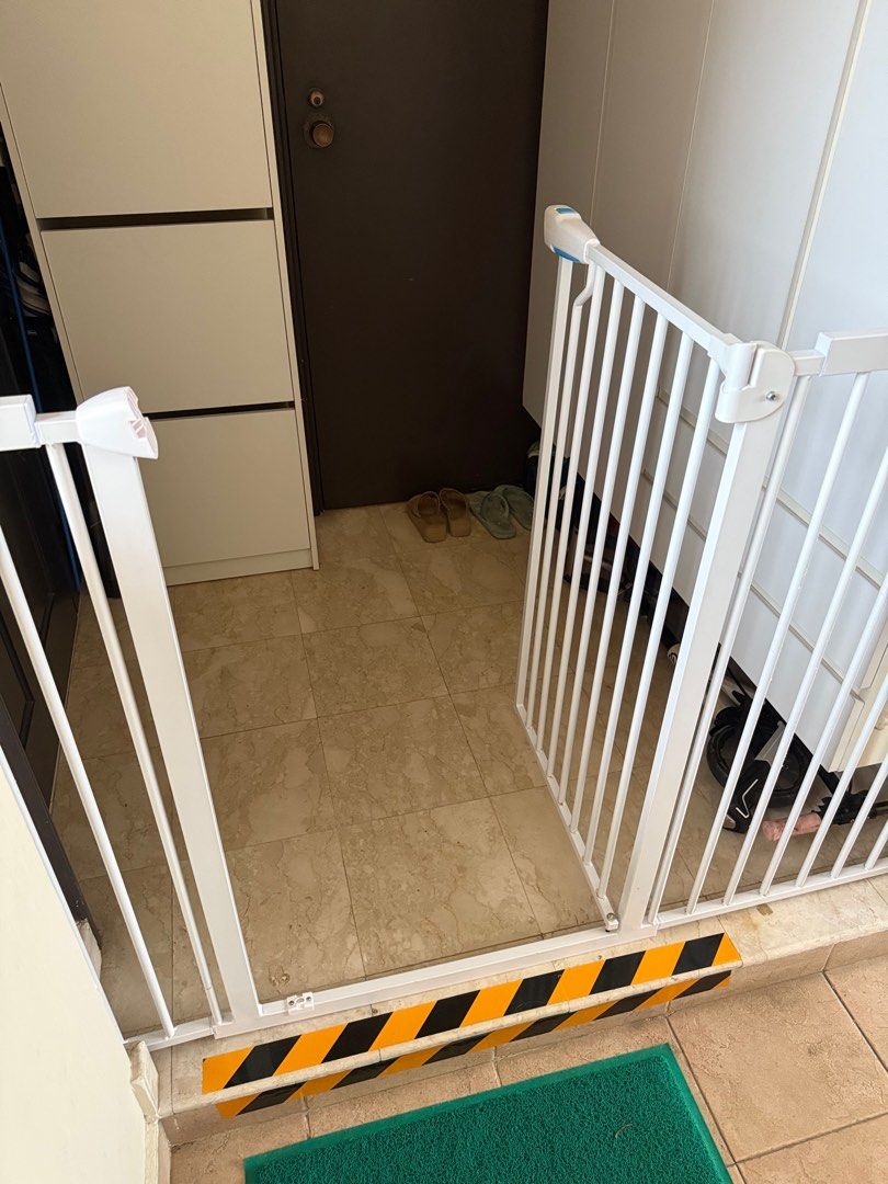 Safety Gate - Adjustable White (Category: Safety Gates, Locks & Protectors) located in Singapore. Submitted by kelvinianl82038 (Listing ID 1378616701, Image 3). Description: White safety gate, perfect for doorways or stairways. Adjustable width, as shown in the images. Easy to install and use. Provides a safe environment for your little ones. Good condition, ready for immediate use..