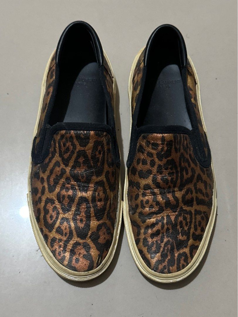 Saint Laurent YSL Leopard Slip On Sneakers (Category: Sneakers) located in Paranaque City. Submitted by j.cwl (Listing ID 1378642767, Image 1). Description: Authentic Saint Laurent YSL Leopard Slip On Sneakers No box Size 38 *has creases.. yellowing of soles.