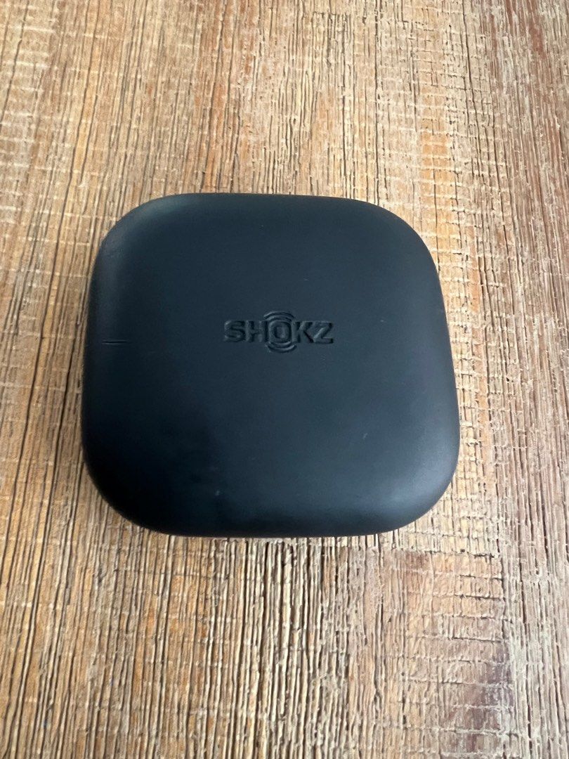 Shokz OpenFit Air Charging Case (Category: Earphones) located in Singapore. Submitted by gadgetsgadgetsgadgets (Listing ID 1378600663, Image 1). Description: Genuine Shokz OpenFit Air charging case. only. Excellent condition. RFS - Misplaced my earbuds. .