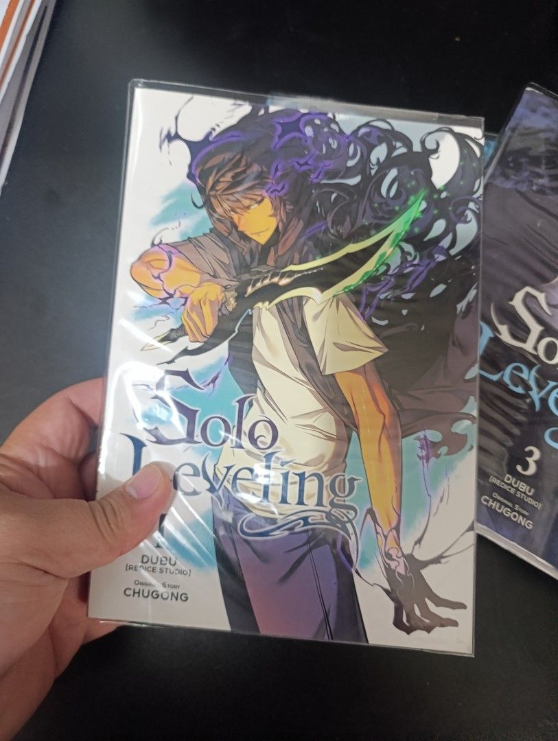 Solo Leveling - Volume 1, 2, 3, 5 (Category: Comics & Manga) located in Manila. Submitted by jonathanb08644 (Listing ID 1378607235, Image 2). Description: Selling as set Haven't read it, with cover. Almost new. Sold as set only..