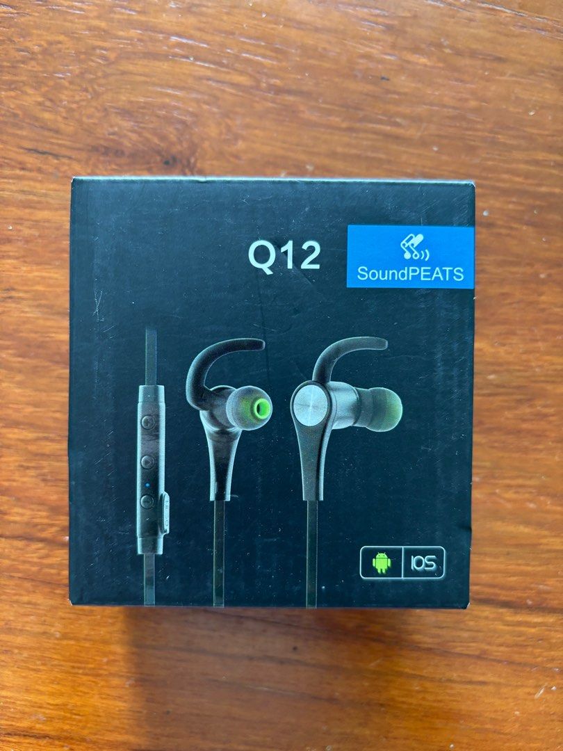 SoundPEATS Q12 Earphones (Category: Earphones) located in Singapore. Submitted by jrjclark (Listing ID 1378604796, Image 1). Description: SoundPEATS Q12 earphones. Compatible with iOS and Android. Features in-ear design with ear hooks for a secure fit. Includes a built-in remote for easy control. Comes in original packaging..