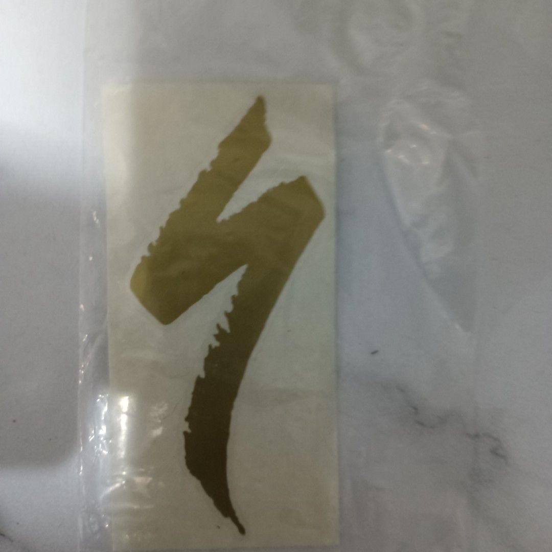 Specialized Bike Frame Decal (Category: Parts & Accessories) located in Singapore. Submitted by downhillbi51527 (Listing ID 1378693065, Image 1). Description: Metallic gold head tube decal. For S-works bike Bukit Batok Street 31.