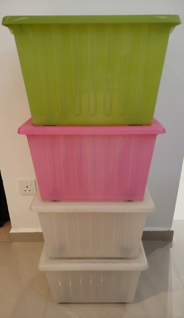 Ikea Vessla storage crate with castors & lids (Category: Kids' Wardrobes & Storage) located in Singapore. Submitted by kelvone (Listing ID 1378597990, Image 1). Description: Pre-owned Ikea Vessla storage crate with castors & lids x 4 for sale @ $16 for all. Original price is $10 for each set. Colours : White x 2, Pink x 1 & Green x 1 Dimensions : 39cm (L) / 39 (W) / 28cm (H) Self collect at Flora Road. Pm if you are interested..