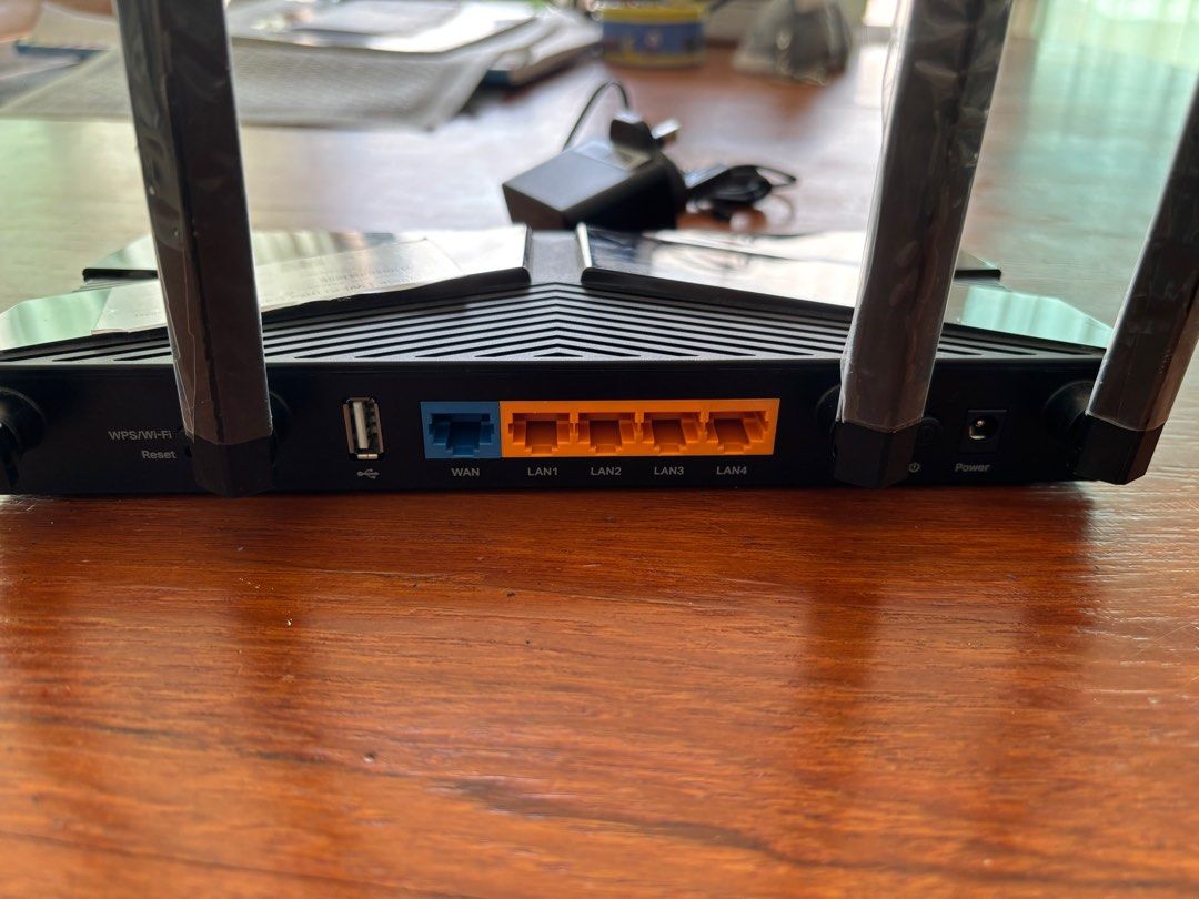TP-Link Archer AX20 AX1800 Dual-Band Wi-Fi 6 Router (Category: Networking) located in Singapore. Submitted by jrjclark (Listing ID 1378604399, Image 1). Description: Selling a TP-Link Archer AX1800 router. It has multiple LAN ports and a USB port. Includes the power adapter. The router is in good condition and ready for use. Perfect for upgrading your home network to Wi-Fi 6..
