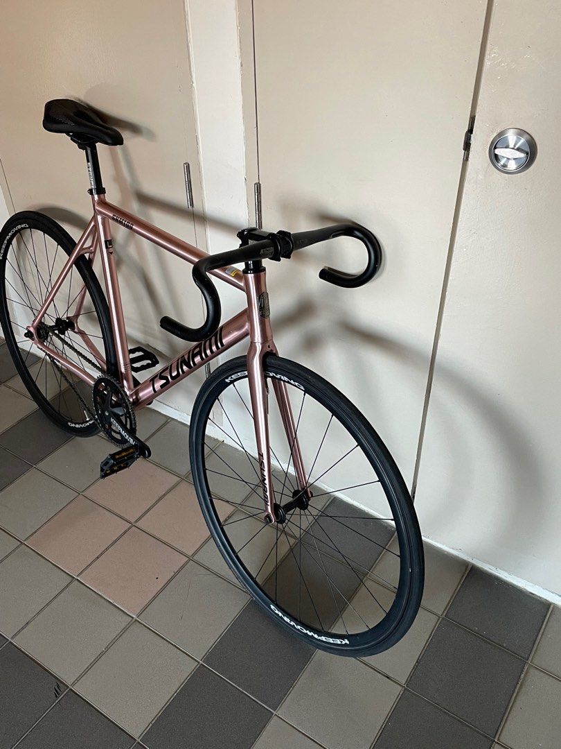 Tsunami Snm100 Full Bike FB Rose Gold Size L for Fixie / Fixed (Category: Bicycles) located in Singapore. Submitted by sourcer88 (Listing ID 1378621593, Image 3). Description: Tele: @chaotaalrdyla Selling at $370,fast deal my convi $360 Price Listed is for Full Bike. Condition: No cracks, No dents. Bike has a few minor scratches around it. Not rlly noticeable frm far. Meet up locations stated below If left on seen means not interested Just offer,
