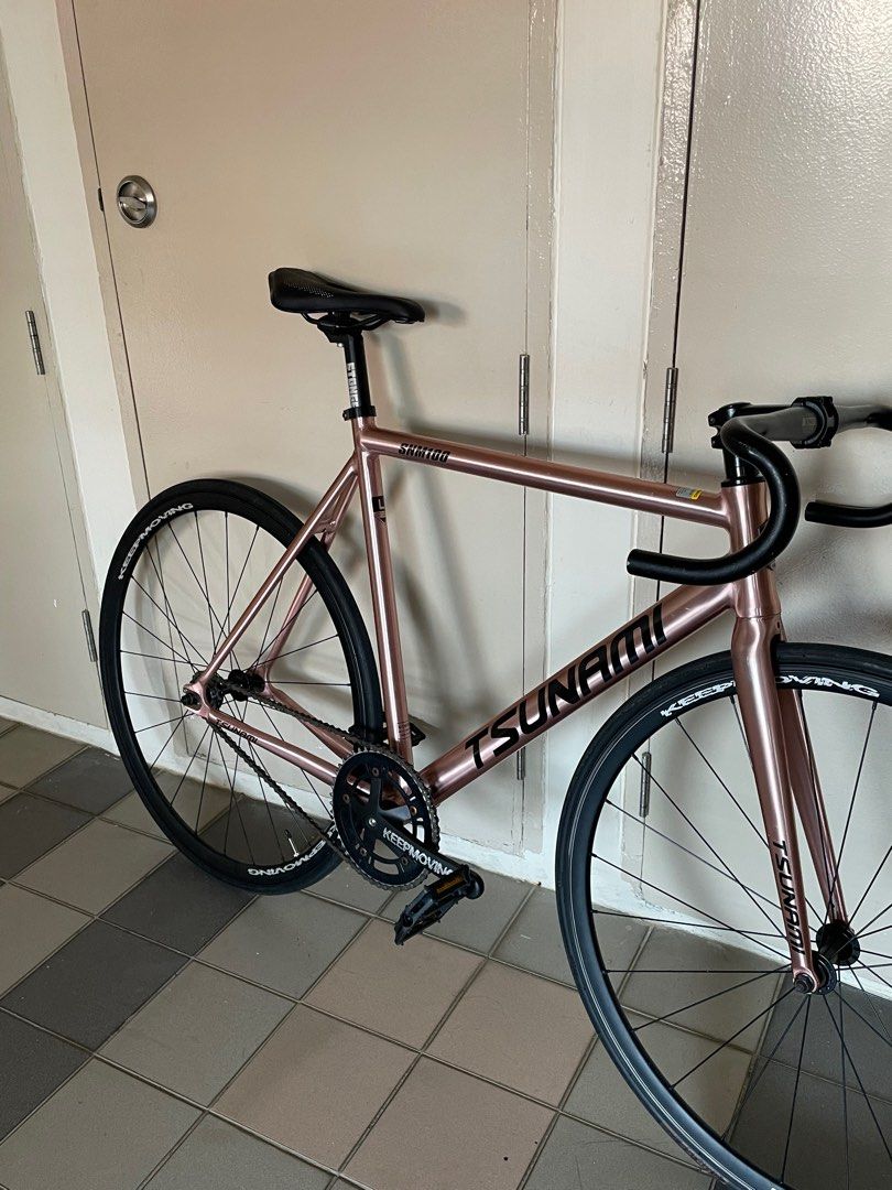 Tsunami Snm100 Full Bike FB Rose Gold Size L for Fixie / Fixed (Category: Bicycles) located in Singapore. Submitted by sourcer88 (Listing ID 1378621593, Image 2). Description: Tele: @chaotaalrdyla Selling at $370,fast deal my convi $360 Price Listed is for Full Bike. Condition: No cracks, No dents. Bike has a few minor scratches around it. Not rlly noticeable frm far. Meet up locations stated below If left on seen means not interested Just offer,