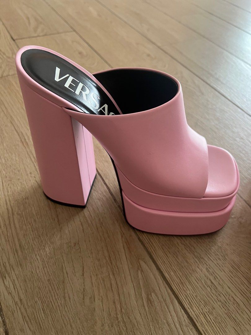 Versace platform mules (Category: Heels) located in Makati City. Submitted by stufffromkim (Listing ID 1378615780, Image 2). Description: They’re quite heavy. Original, complete with Box. Color is blush pink or like a light bubble gum pink. Made in Italy. Used twice only. .