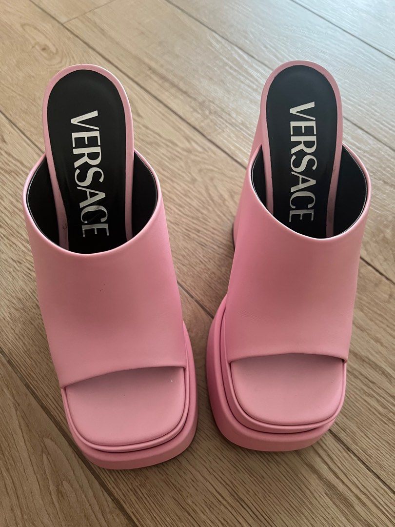 Versace platform mules (Category: Heels) located in Makati City. Submitted by stufffromkim (Listing ID 1378615780, Image 1). Description: They’re quite heavy. Original, complete with Box. Color is blush pink or like a light bubble gum pink. Made in Italy. Used twice only. .