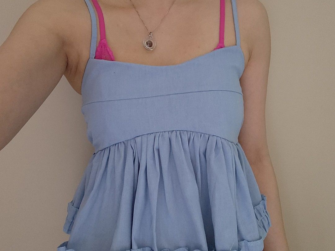 Y2K Babydoll Top (Category: Sleeveless) located in Singapore. Submitted by wonderofturquoise (Listing ID 1378598804, Image 1). Description: brand new with no defects.