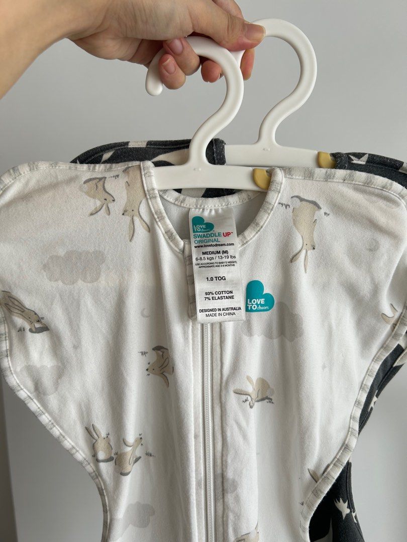 2 x M Size Love to Dream 1.0 TOG Swaddles (Category: Babies & Kids Fashion) located in Singapore. Submitted by oovebi (Listing ID 1378808427, Image 3). Description: Size M TOG 1.0 Original UP: $60+++ / Piece Conditions / Price for Each 1. Moon 🌙 - 7/10 $15 - Well used and loved because it’s such a cute design!!! It’s starting to fur a little at the edges and the colour has faded a little. Many, many more wears to go. 2. Rabbit 🐰 - 8/10 $20 - In