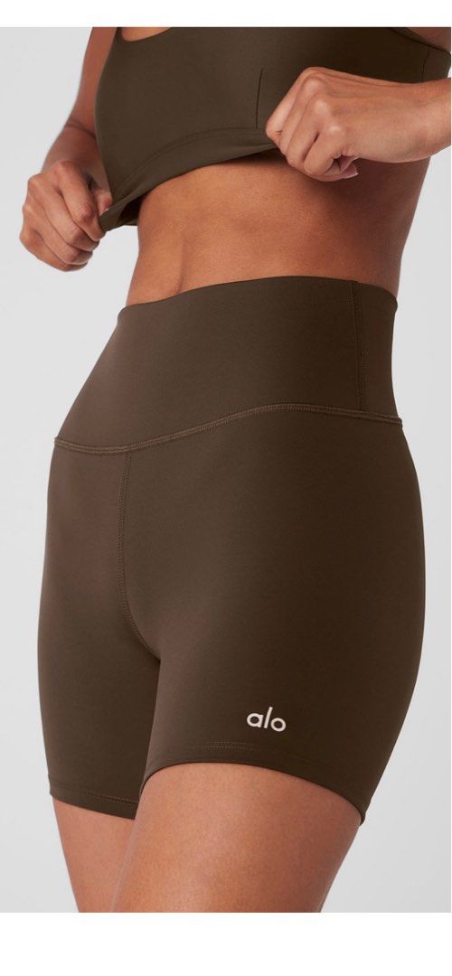 Alo Yoga High Waist Biker Shorts (Category: Activewear) located in Singapore. Submitted by tamagoislove (Listing ID 1378751654, Image 1). Description: Available in brown and black colour Only worn twice .