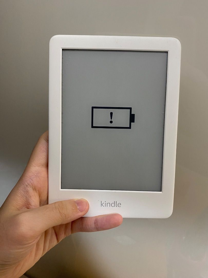Amazon Kindle E-reader - White (Category: E-Readers) located in Singapore. Submitted by gweenteamo37386 (Listing ID 1378895454, Image 1). Description: Up for sale is a Kindle Paperwhite e-reader. The device is white. The model number is J9G29R. Additional details are shown in the images. .