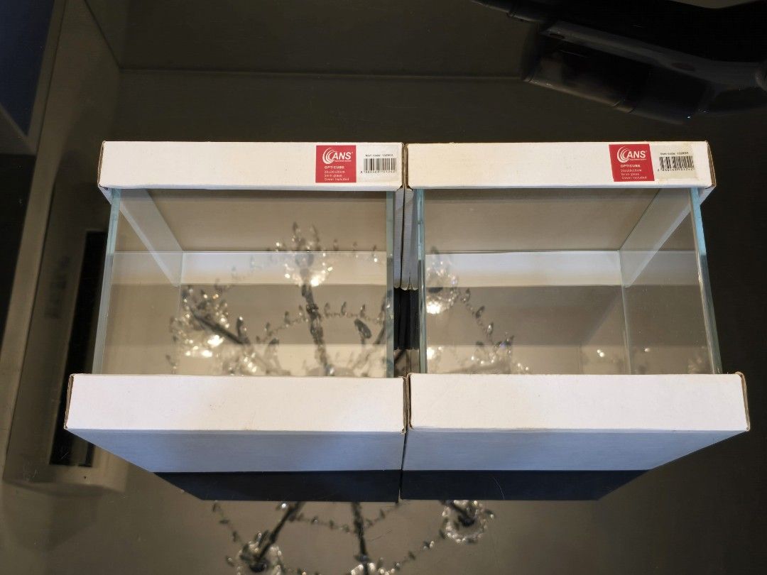 ANS Glass Aquarium Tank Set (Category: Homes & Other Pet Accessories) located in Singapore. Submitted by dlimkw (Listing ID 1378735968, Image 1). Description: - Set of two ANS glass aquarium tanks 20cm×20cm×20cm - Tanks are BRAND NEW - No glass cover - Suitable for small fish or aquatic plants - Comes with original packaging - Take both for $30.