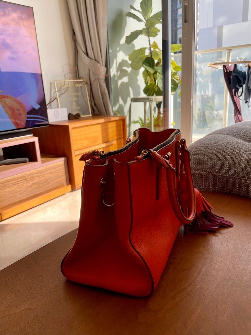 Any Hindmarch Handbag (Category: Bags & Wallets) located in Singapore. Submitted by minimicloset (Listing ID 1378878561, Image 2). Description: Original price over S$1,000 Size: 30cm x 22cm x 16cm .
