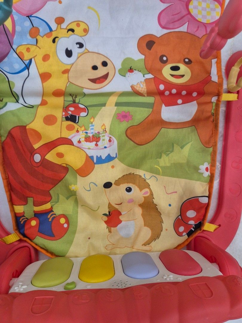 Baby Playmat with Hanging Toys (Category: Infant Playtime) located in Singapore. Submitted by xiaoyingziii (Listing ID 1378864048, Image 3). Description: - Colourful baby playmat - Soft mat with animal illustrations - Overhead arch with hanging toys - Stimulates baby's senses - able to play music and lights - Features musical component - In good condition - comes with the bix for storage.