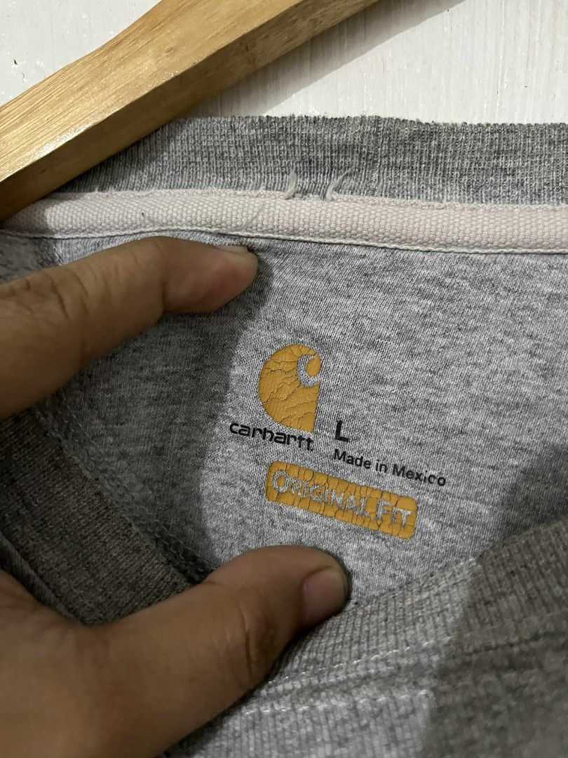 Carhartt (Category: Coats, Jackets and Outerwear) located in Quezon City. Submitted by needforthrift (Listing ID 1378855175, Image 3). Description: Vintage Carhartt Blank Gray Sweatshirt Crewneck dimes: 25 width 29.5 length very good condition color rate : 9.8 / 10 issue: distress ribbings check the photo.