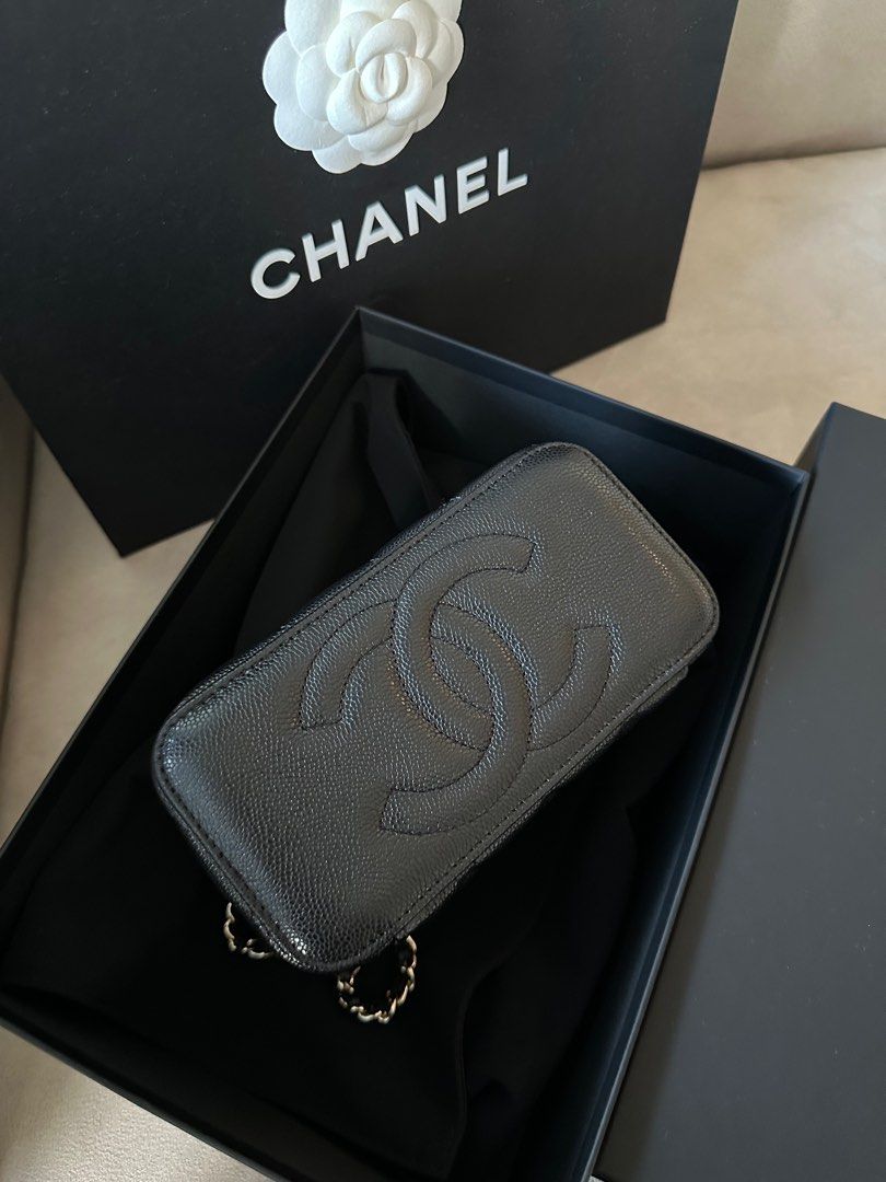 Chanel long Vanity Case with Chain (Category: Bags & Wallets) located in Singapore. Submitted by esteee123 (Listing ID 1378824299, Image 2). Description: Brand new Chanel Long Vanity Case with chain. Gold hardware. Comes with original box, shopping bag, receipt and camellia flower. There’s a mirror and lipstick compartment inside. .
