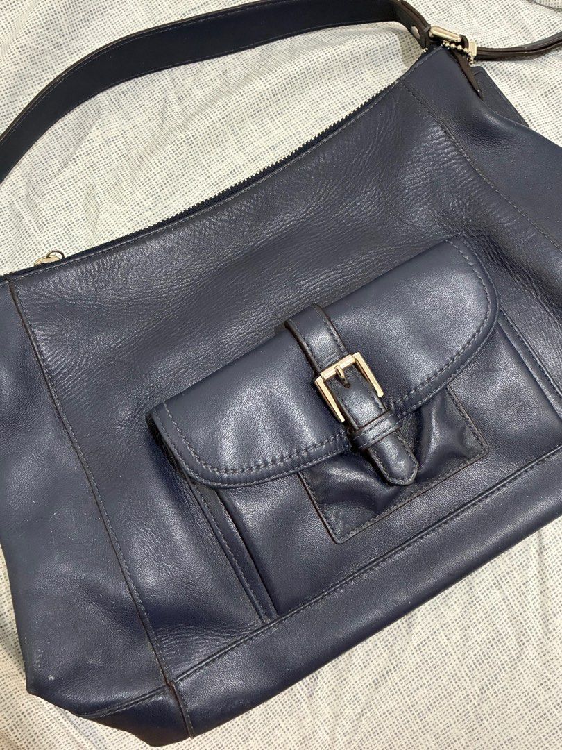 Coach Shoulder Bag in Navy (Category: Shoulder Bags) located in Makati City. Submitted by bodegavendetta (Listing ID 1378805950, Image 2). Description: - selling low due to white storage marks on the sides of the bags and small white marks on the body of the bag - never used, just stored - inside is flawless.