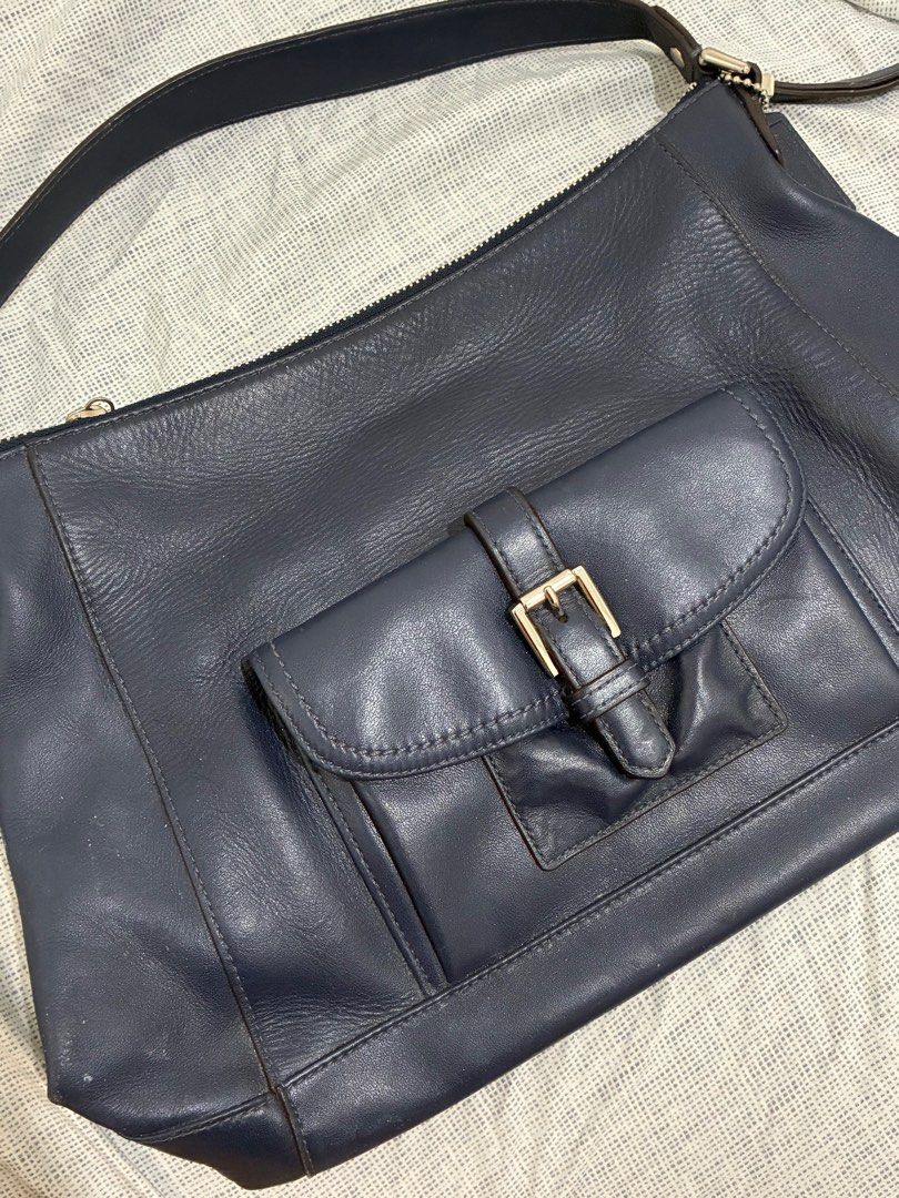 Coach Shoulder Bag in Navy (Category: Shoulder Bags) located in Makati City. Submitted by bodegavendetta (Listing ID 1378805950, Image 1). Description: - selling low due to white storage marks on the sides of the bags and small white marks on the body of the bag - never used, just stored - inside is flawless.