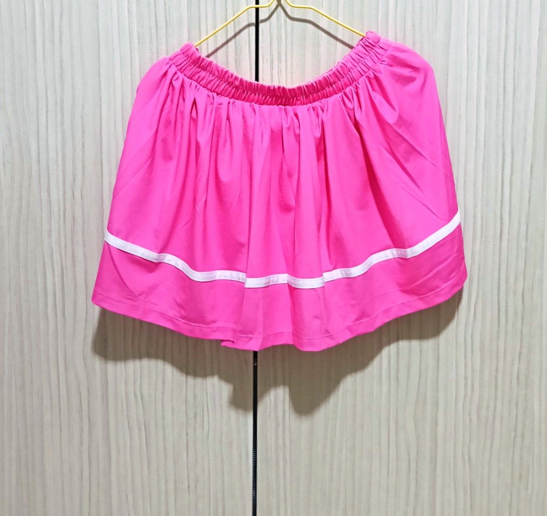 Colorful Elastic Waist Skirts - Various Colors (Category: Babies & Kids Fashion) located in Singapore. Submitted by adeqleo (Listing ID 1378900817, Image 2). Description: Comfortable skirts with elastic waistbands and inner pants inside. Available in orange, pink, and coral with a white stripe. Casual and perfect for everyday wear..