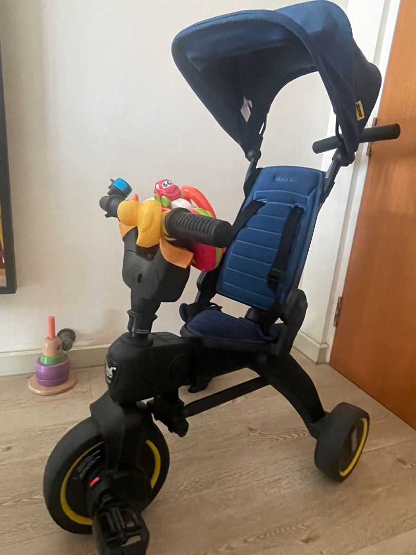 Doona S3 Liki trike (Blue) (Category: Strollers) located in Singapore. Submitted by naughtyegg228 (Listing ID 1378779245, Image 3). Description: Included storage bag, steering wheel driving toy (with sounds).