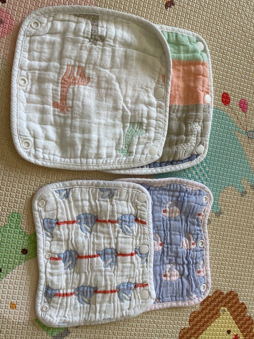 Drool pad for baby carrier (Category: Babies & Kids Fashion) located in Singapore. Submitted by declutteringtoday (Listing ID 1378751771, Image 3). Description: Set of 8 adorable baby drool pad. Features various cute patterns and designs. Made of soft, absorbent material. Perfect for keeping your little one clean and comfortable. Pick up from Mount Sinai near Clementi.