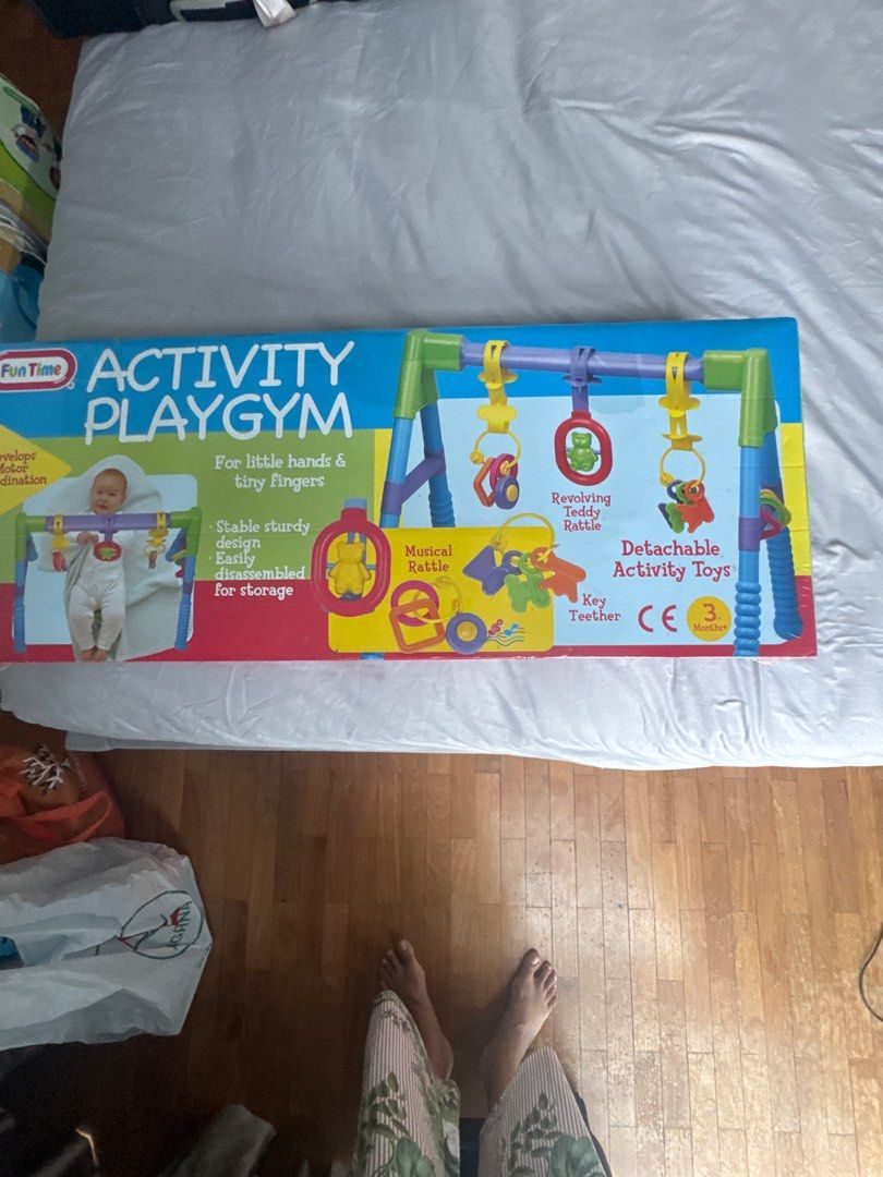 Fun Time Activity Playgym (Category: Infant Playtime) located in Singapore. Submitted by niggs_k (Listing ID 1378755204, Image 2). Description: New, unopened box. Fun Time Activity Playgym for little hands and tiny fingers. Includes detachable activity toys, a musical rattle, and a key teether. Stable and sturdy design, easily disassembled for storage. Suitable for babies aged 3 months and up..