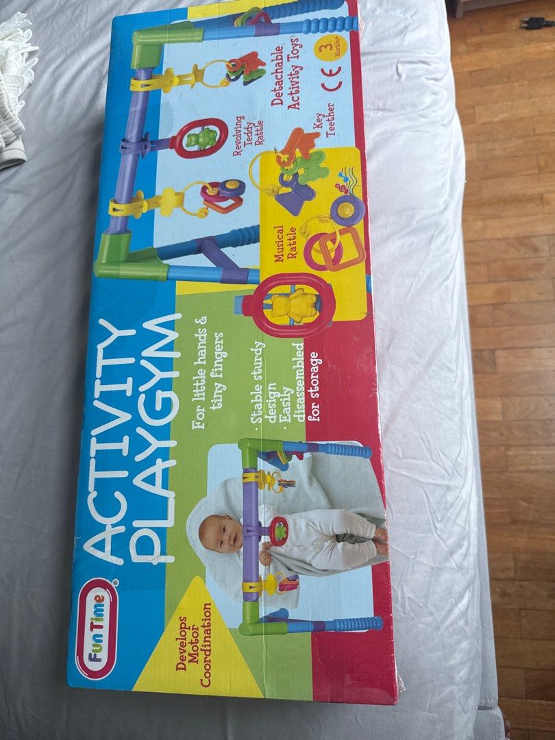 Fun Time Activity Playgym (Category: Infant Playtime) located in Singapore. Submitted by niggs_k (Listing ID 1378755204, Image 1). Description: New, unopened box. Fun Time Activity Playgym for little hands and tiny fingers. Includes detachable activity toys, a musical rattle, and a key teether. Stable and sturdy design, easily disassembled for storage. Suitable for babies aged 3 months and up..