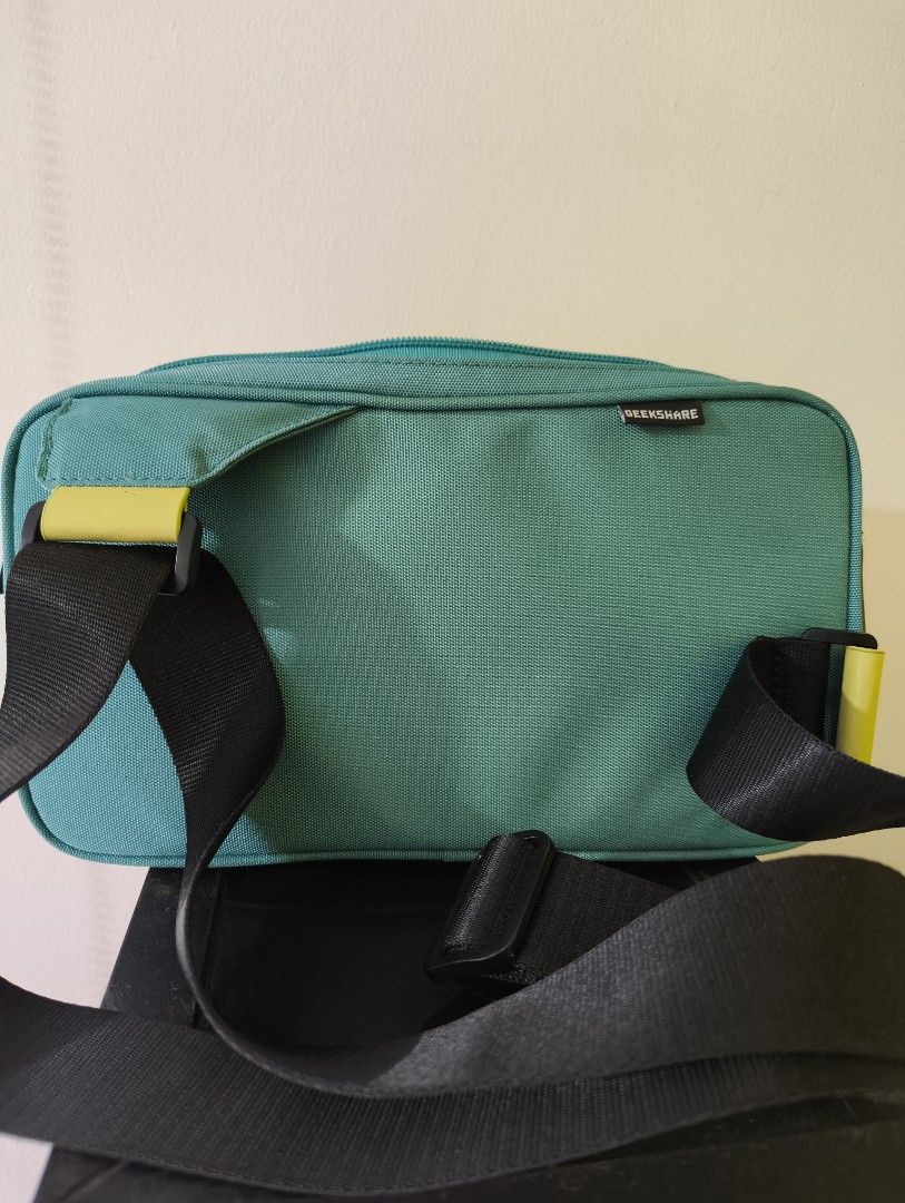 Geekshare Nintendo Switch Messenger Bag (Category: Cases & Covers) located in Muntinlupa City. Submitted by tophtejada (Listing ID 1378771584, Image 3). Description: - Dimensions: 10.24"L x 5.91"H x 2.36"W - Adjustable shoulder strap - Fits one Nintendo Switch in the main pocket - Used once.