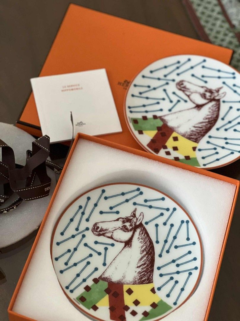 Hermes Tea / Coffee Plates (Category: Coffee & Tea Tableware) located in Muntinlupa City. Submitted by closet.confessions (Listing ID 1378783585, Image 1). Description: Authentic Brand New/ Never Used coffee/ tea plates set (2pcs) comes with box, care booklet & ribbon perfect for gifting bought from Hermes Greenbelt.