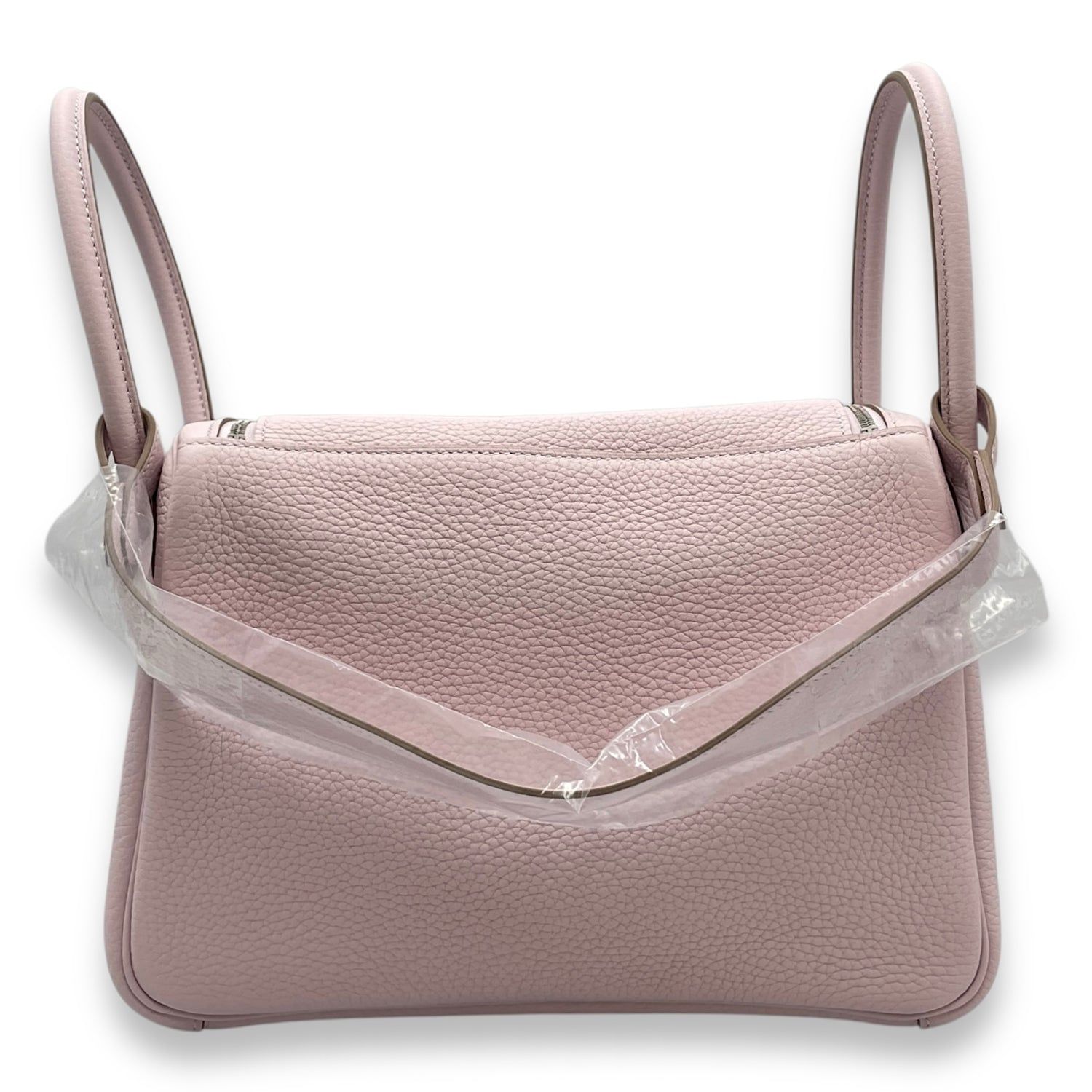 Hermès Lindy 26 Mauve Pale in Clemence, Palladium hardware (Category: Bags & Wallets) located in Singapore. Submitted by luxlexicon (Listing ID 1378787661, Image 2). Description: SKU CL2507-13897 Brand Hermès Material Clemence Color Mauve Pale Hardware Palladium Accessories DUSTBAG,BOX,ORIGINALRECEIPT Series W Root Category Bags Condition Overall: in unused, brand new condition.