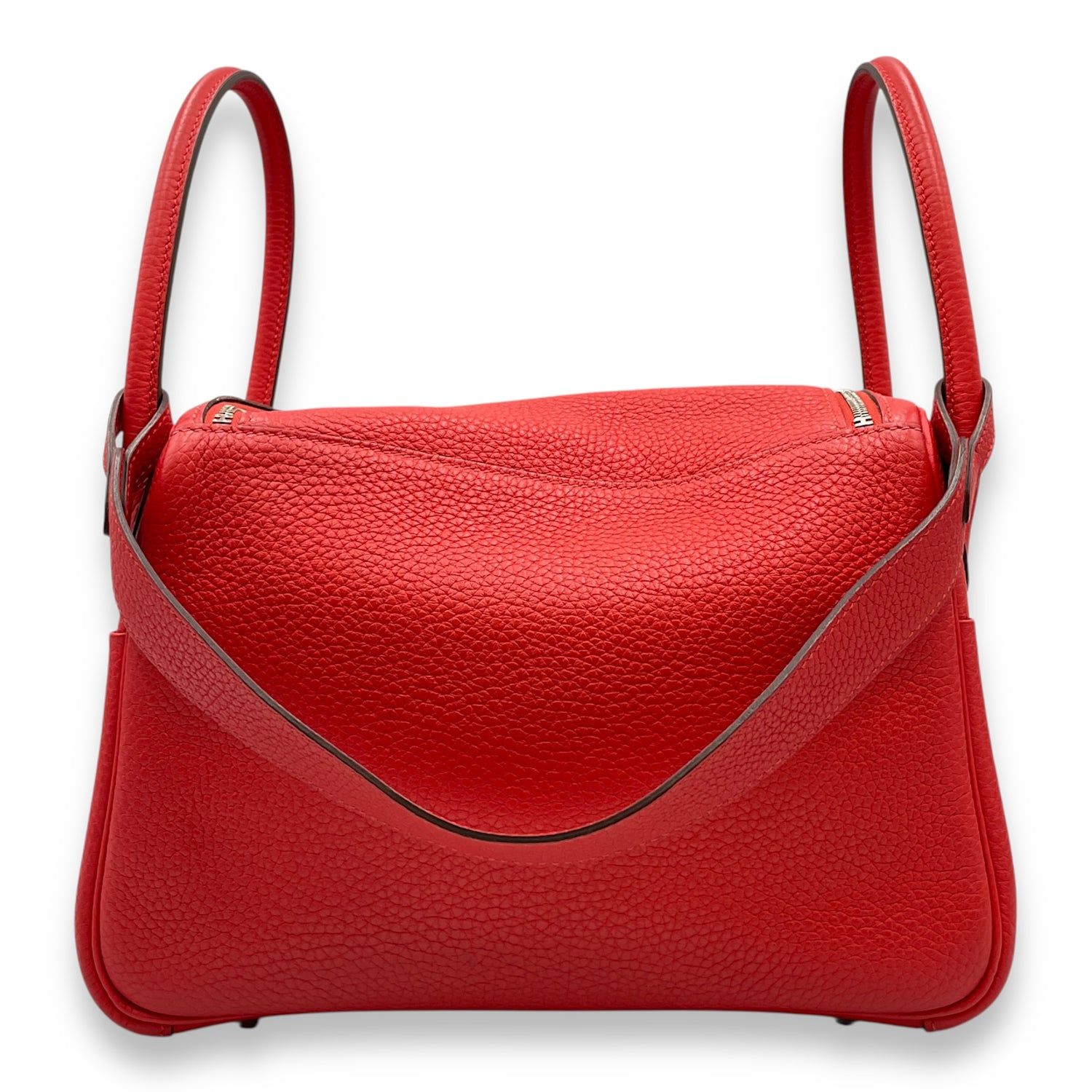 Hermès Lindy 26 Rouge Tomate in Clemence, Palladium hardware (Category: Bags & Wallets) located in Singapore. Submitted by luxlexicon (Listing ID 1378787677, Image 2). Description: SKU CL2507-13888 Brand Hermès Material Clemence Color Rouge Tomate Hardware Palladium Accessories Series X Root Category Bags Condition - Bottom Edge / Base / Bagfeet: Minor scuffing.