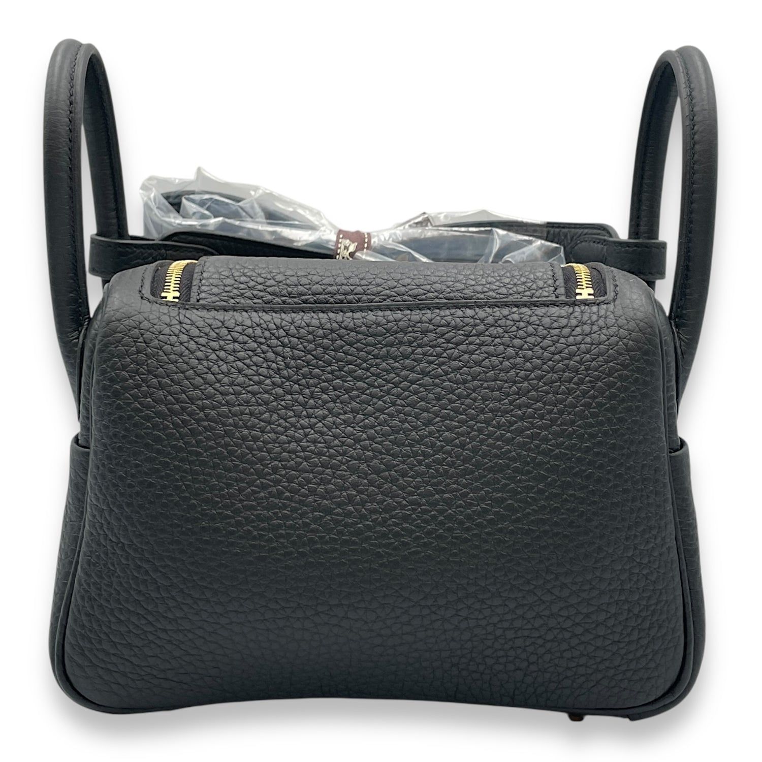 Hermès Lindy II Mini Black in Clemence, Gold hardware (Category: Bags & Wallets) located in Singapore. Submitted by luxlexicon (Listing ID 1378787676, Image 2). Description: SKU CL2507-13889 Brand Hermès Material Clemence Color Black Hardware Gold Accessories DUSTBAG,BOX,COPYRECEIPT Series K Root Category Bags Condition Overall: in unused, brand new condition.