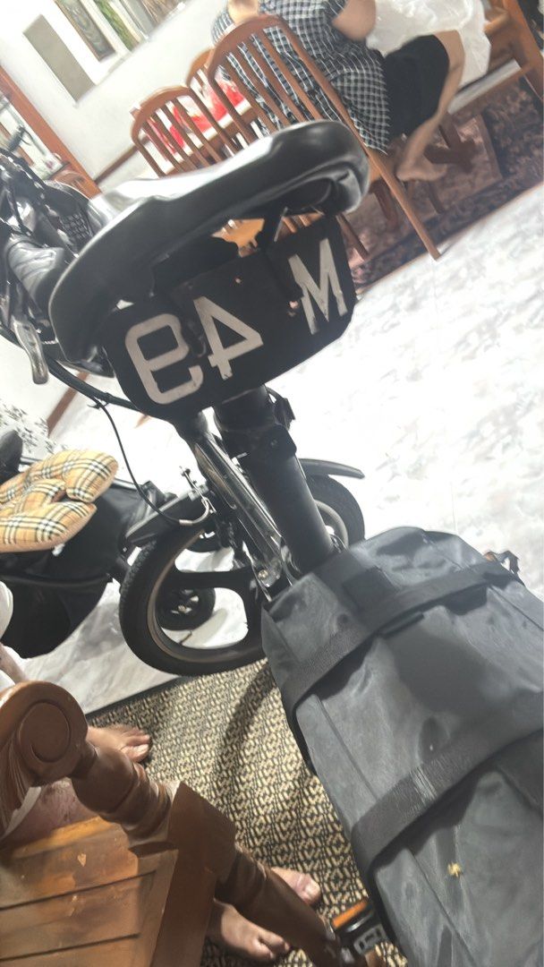 Kuo+ Electric Folding Bicycle (Category: Bicycles) located in Singapore. Submitted by miscbuys (Listing ID 1378896391, Image 2). Description: - Black Kuo+ electric folding bicycle - Good condition - Includes 2 battery 48v 19AH 48V 24Ah - Foldable design for easy storage and transport - Ideal for commuting or leisure rides - if deal, on the spot transfer ownership Price Negotiable .